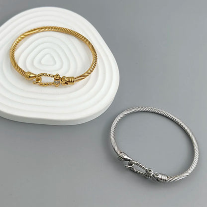 New steel wire button pattern horseshoe gold-plated stainless steel bracelet 18K, high quality waterproof couple bracelet, wife